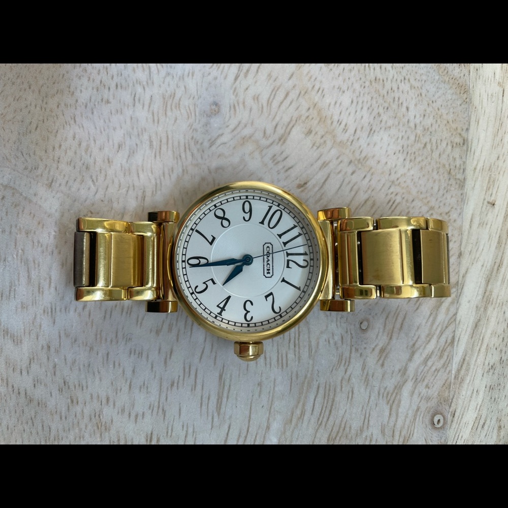 Gold coach watch